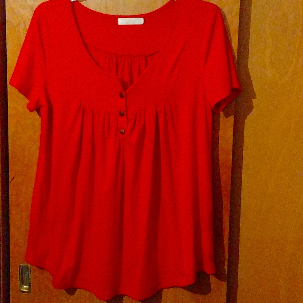 XL red short sleeve button shirt.